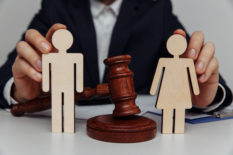How are risky or invaluable assets divided in a divorce?